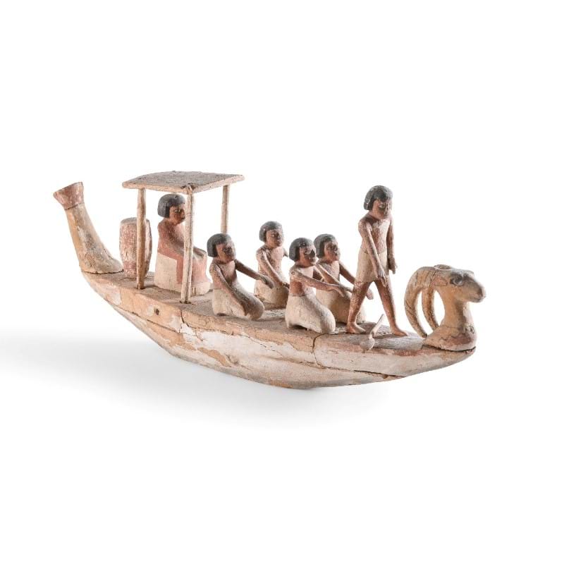 An Egyptian Wood Funerary Boat With Crew, Middle Kingdom, Circa 2133-1979 B.C.