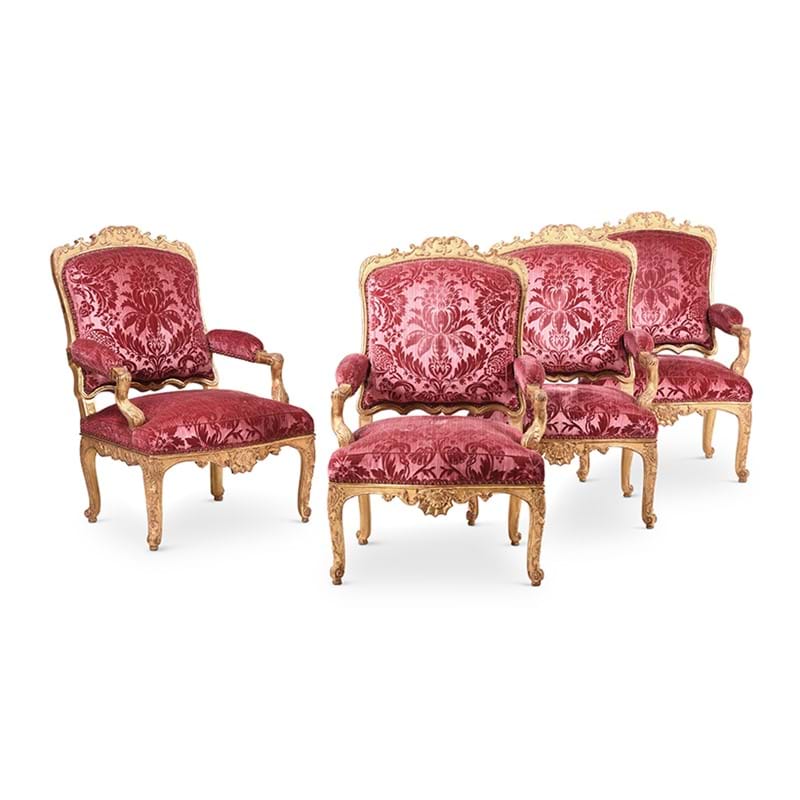 A set of four Régence giltwood fauteuils a la Reine, early 18th century