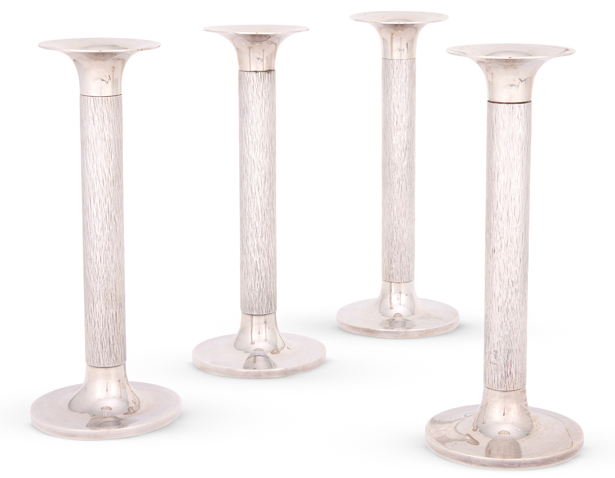 Lot 29 Gerald Benney, A Set Of Four Silver Candlesticks