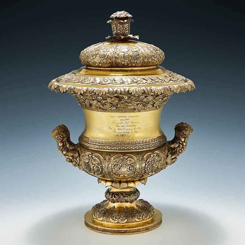 An Indian colonial silver gilt twin handled trophy cup and cover, Hamilton & Co., Calcutta, circa 1830
