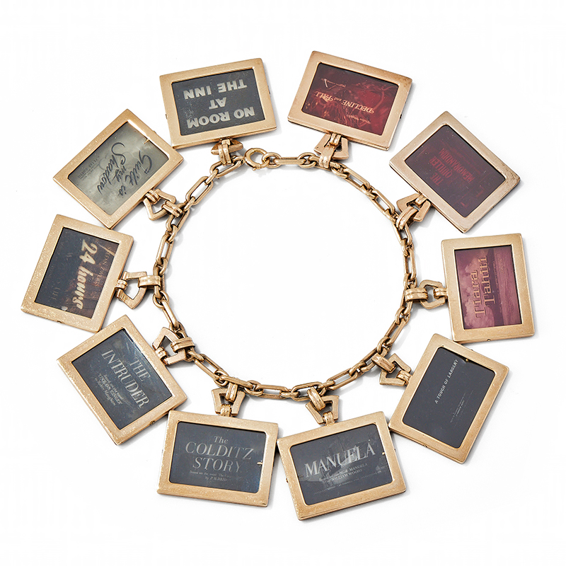 Cartier, a bespoke charm bracelet, circa 1948-1968
