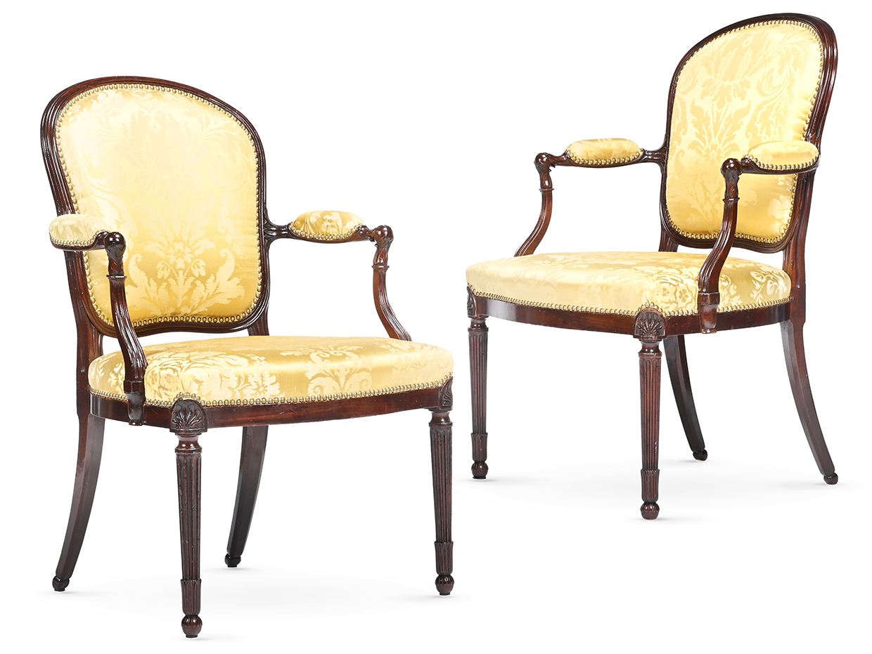 129 A FINE PAIR OF GEORGE III MAHOGANY ARMCHAIRS, ATTRIBUTED TO JOHN LINNELL, CIRCA 1775