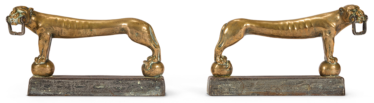 Lot 55 A PAIR OF BRASS AND LEAD ELONGATED LEOPARDS 19TH CENTURY
