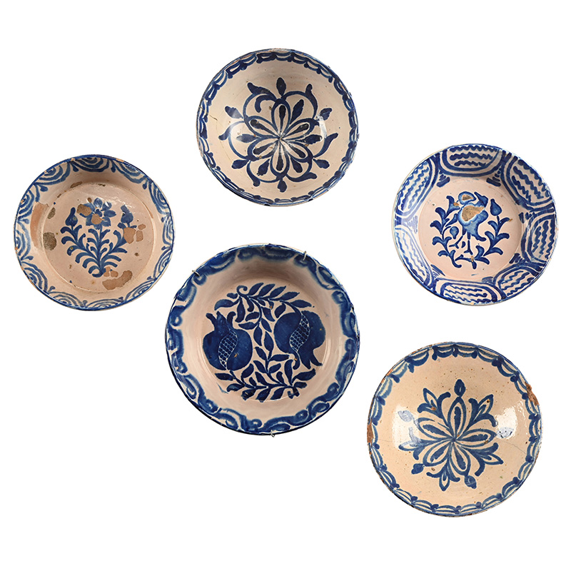 Five Spanish maiolica blue and white dishes, various dates 19th and 20th centuries