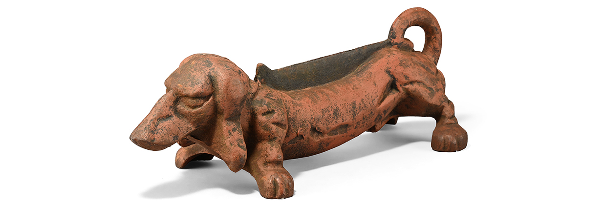 Lot 1041 AN ART DECO CAST IRON DACSHUND BOOT SCRAPER OR DOOR STOP, FIRST HALF 20TH CENTURY (1)