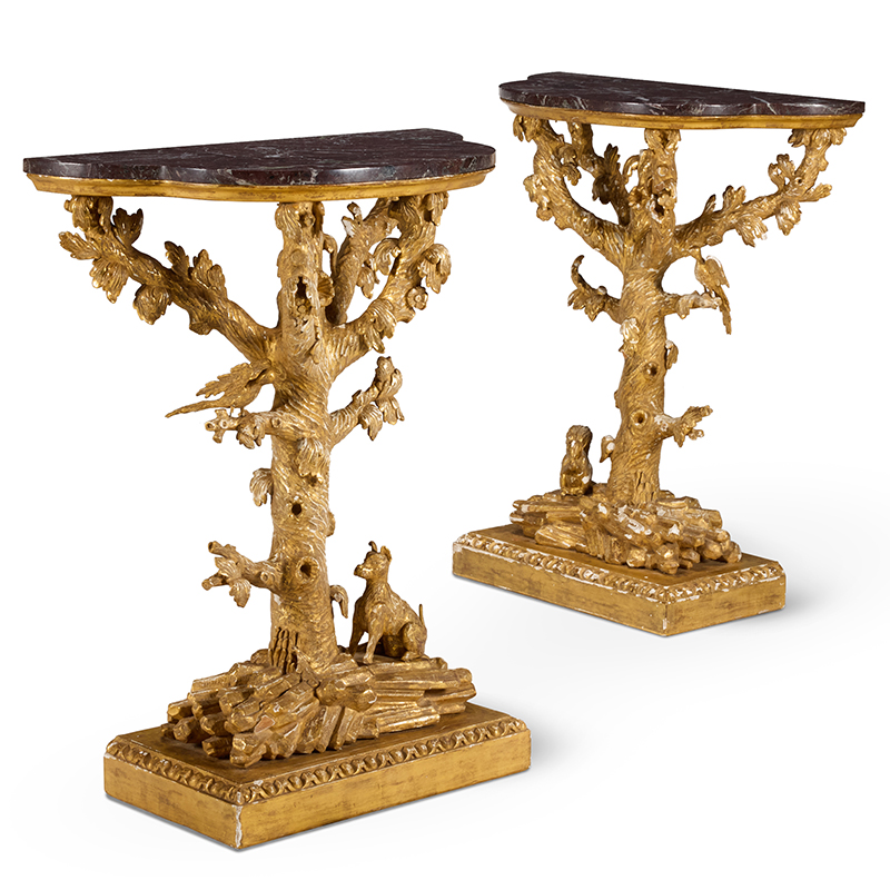 A pair of giltwood and composition console tables, in the manner of Thomas Johnson, 20th century